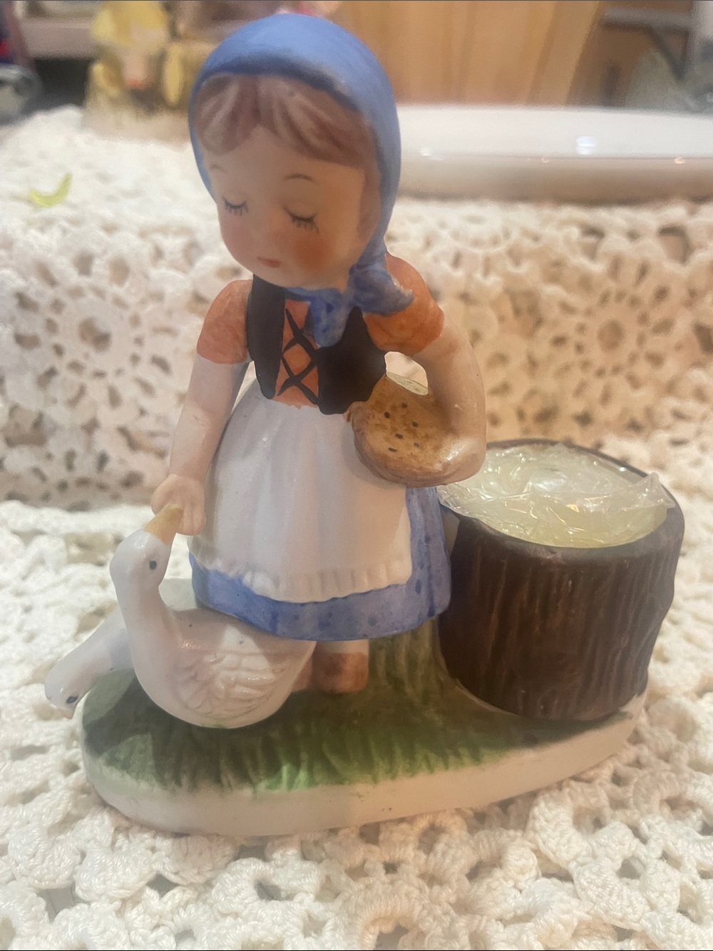 Veronica Vergasi Blue-Accented Girl & Goose candle holder
